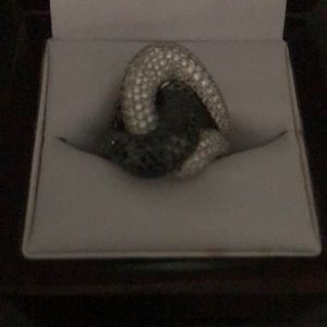 18 k white gold , hand designed with 2 k of white Diamonds and black diamonds